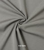 A swatch of knit pique fabric in a grey color, showing the texture and weave of the material.