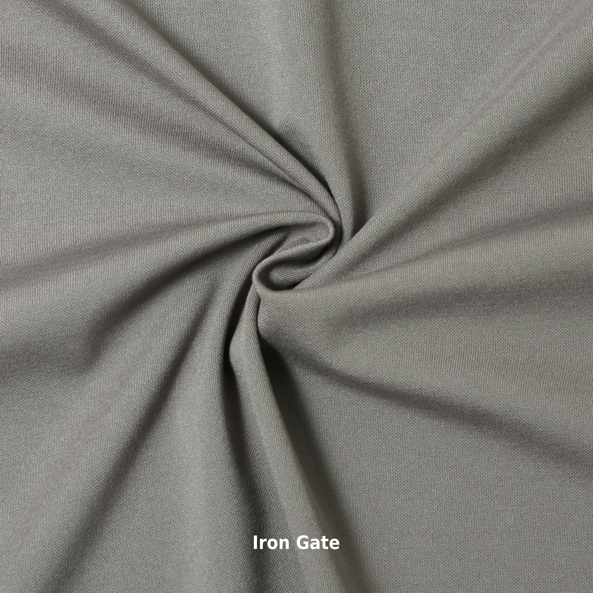 A swatch of knit pique fabric in a grey color, showing the texture and weave of the material.