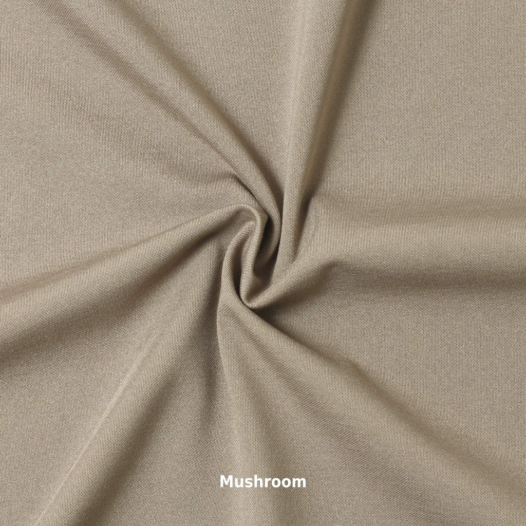 A swatch of knit pique fabric in a taupe color, showing the texture and weave of the material.