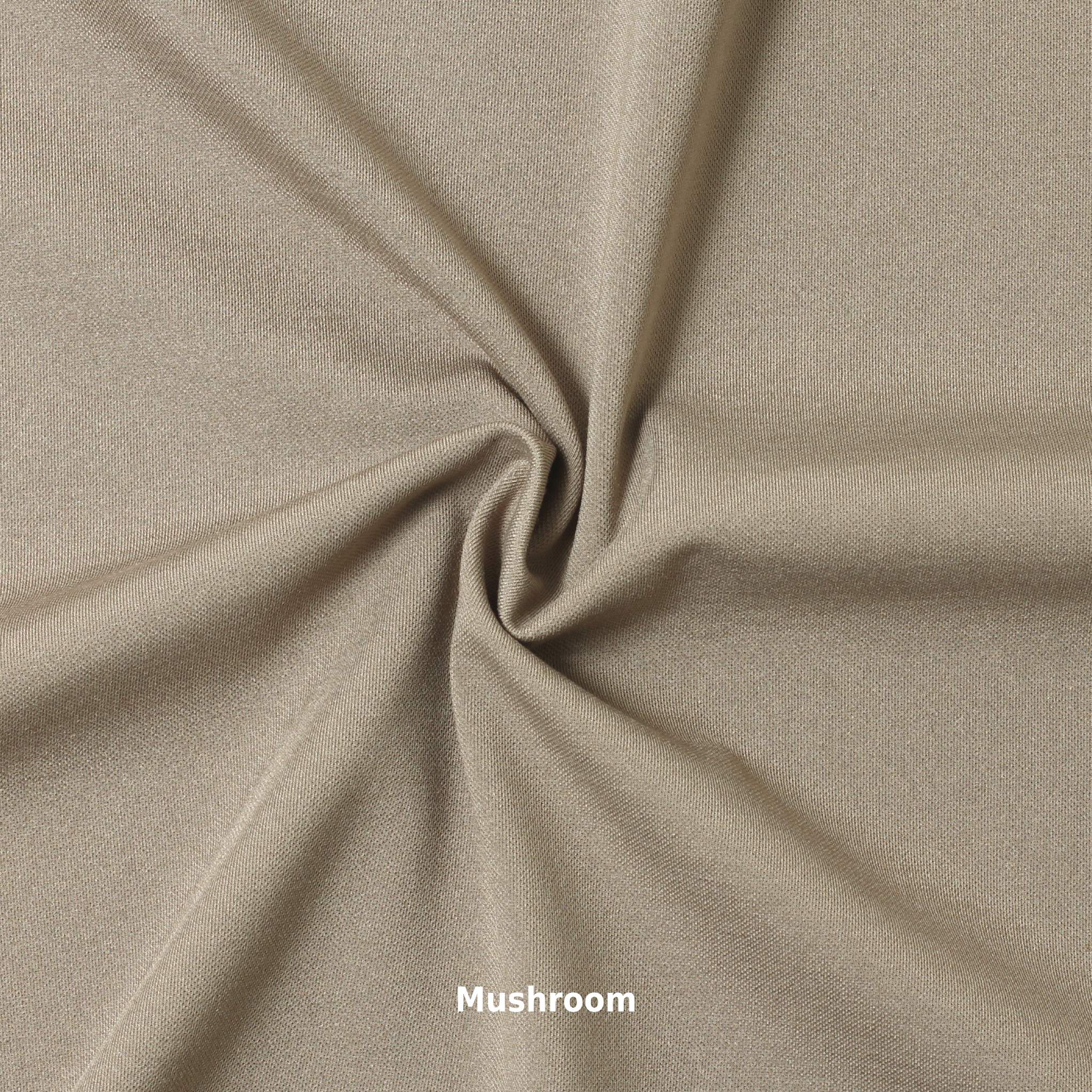 A swatch of knit pique fabric in a taupe color, showing the texture and weave of the material.
